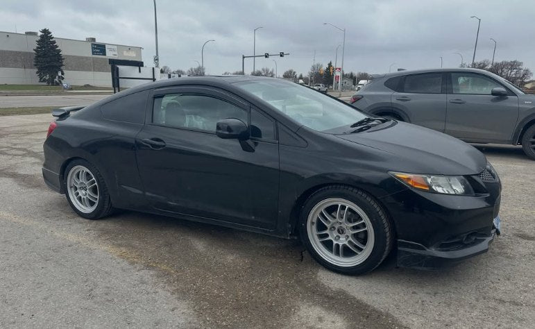 Honda Civic coupe with aftermarket wheels installed at Project Wheel Works