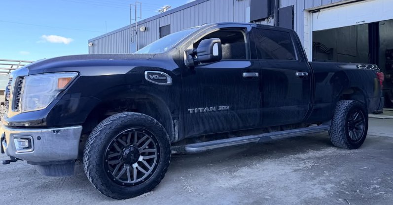 Nissan Titan XD wheel and tire setup installed at Project Wheel Works